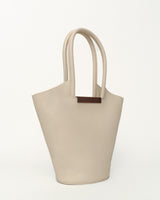 Small garden tote bag in cream with walnut wood bar, crafted from grained taurillon leather.
