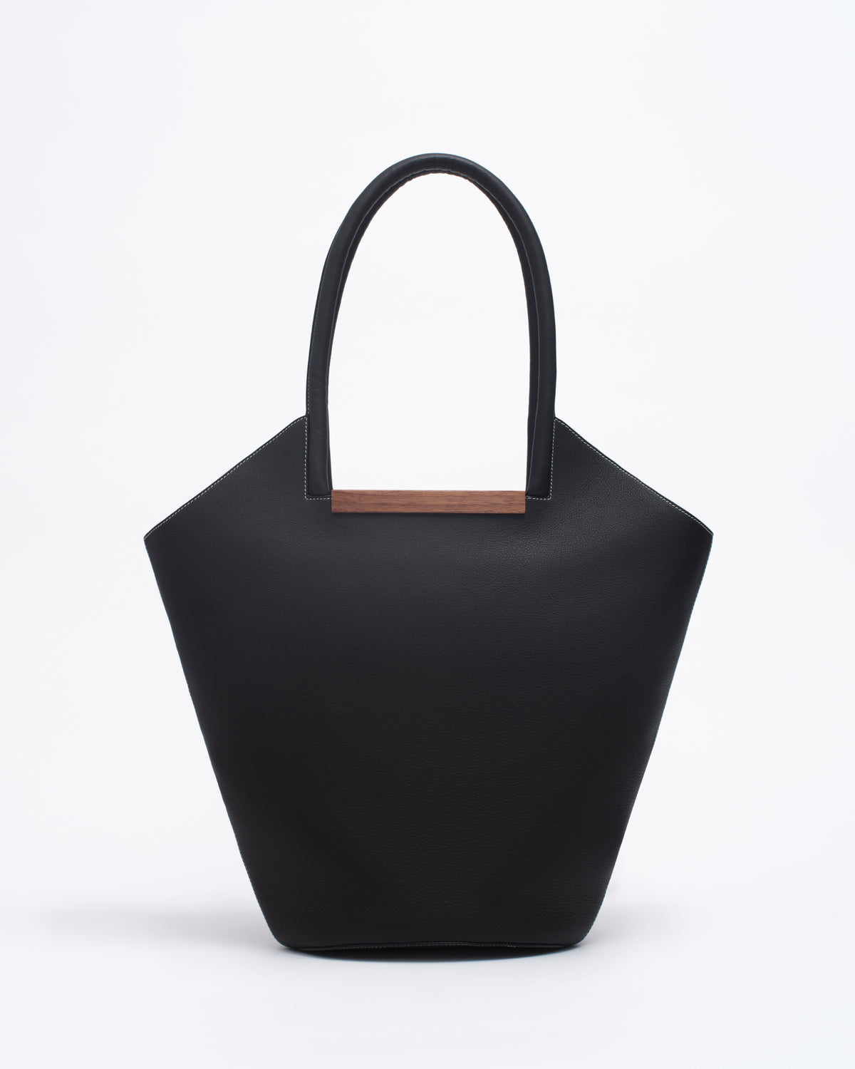 Garden Tote bag in black - contrast stitch featuring a wooden crafted U bar and spacious design for versatile use.