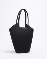 Garden Tote bag in black - contrast stitch with wooden crafted handle, showcasing a sculptural design and soft suede texture.