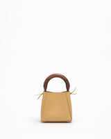 structured leather quinta bag in amber front view