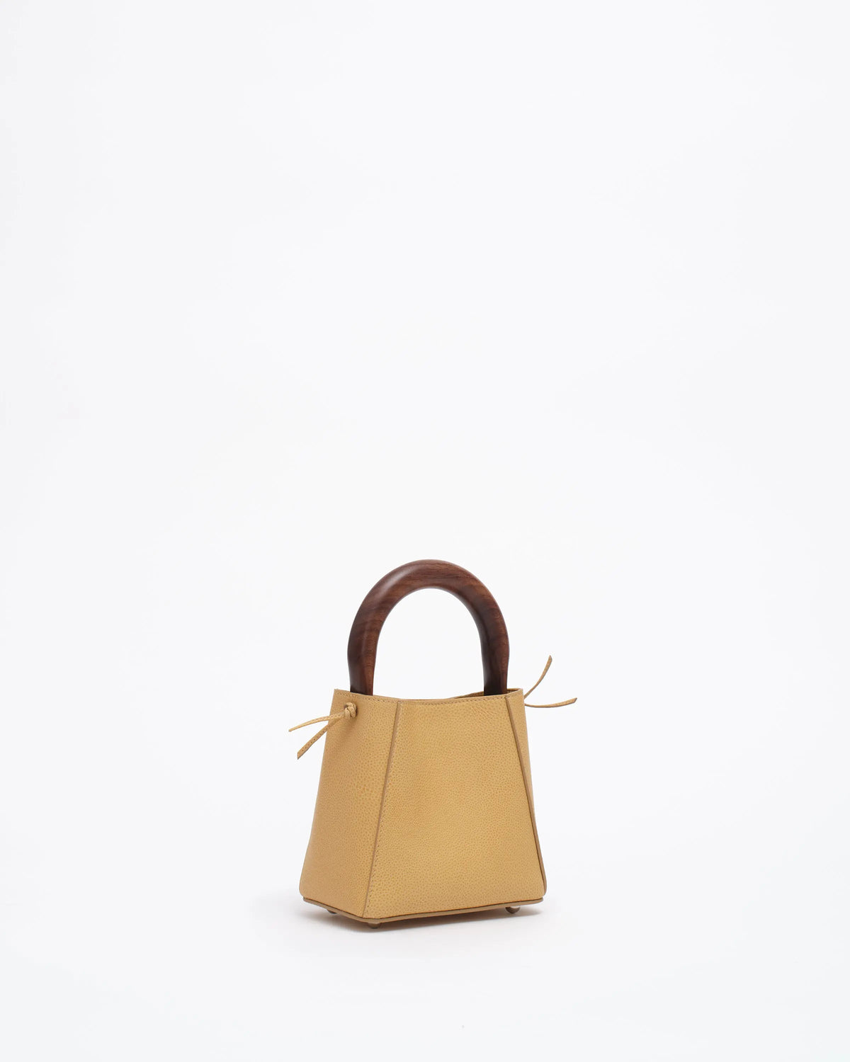 structured leather quinta bag in amber front side view
