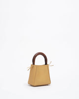 structured leather quinta bag in amber front side view