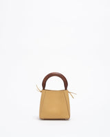 structured leather quinta bag in amber front view