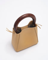 structured leather quinta bag in amber top view
