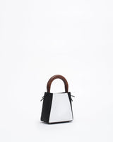 structured leather quinta bag in black and white front side view