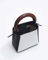 structured leather quinta bag in black and white top view