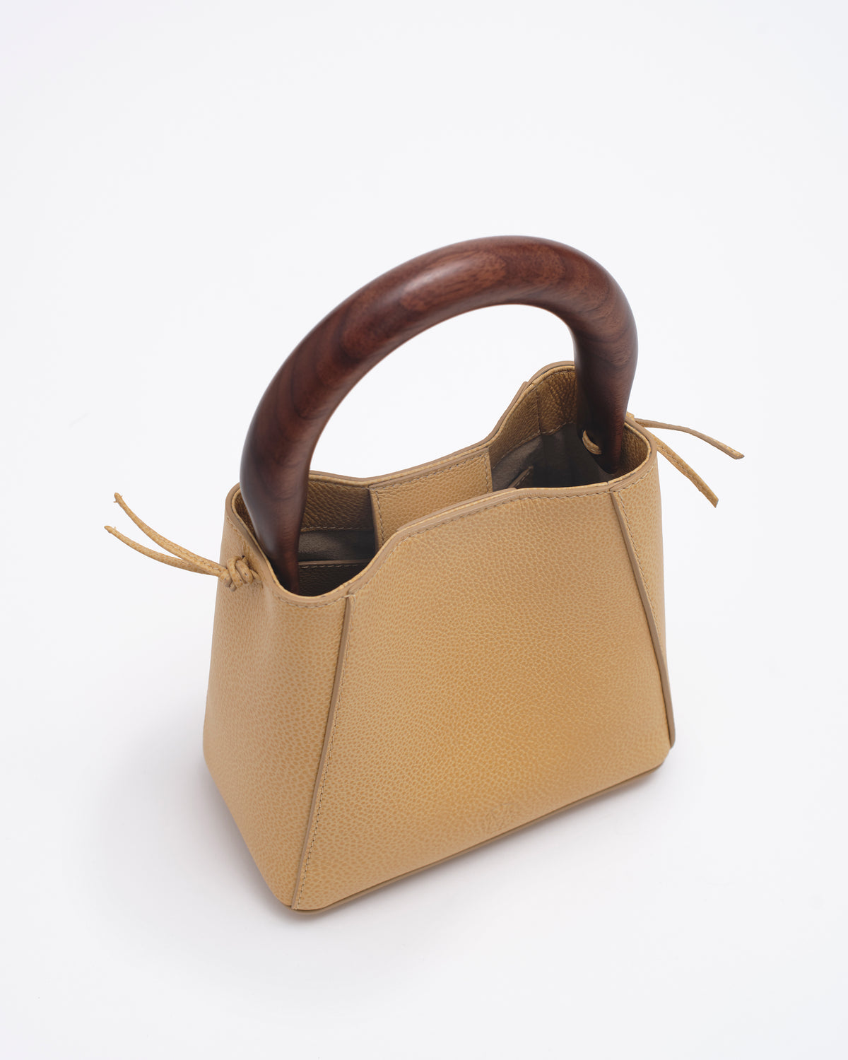 structured leather quinta bag in amber top view